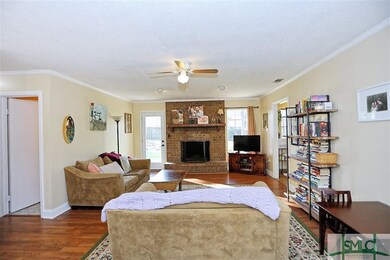 GREAT ROOM WITH NEW MOULDINGS AND FRESH LIGHTING!