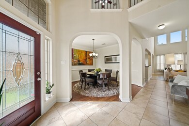 Entryway opens up to a formal dining room