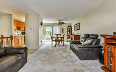 View of living room looking into the dining room