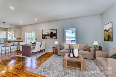 Main level living room ,breakfast bar and dining area