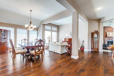 Wood floors continue throughout...large windows ad