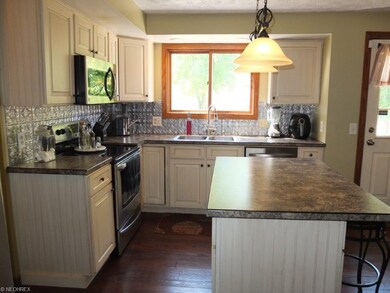 Another view of the beautiful kitchen.
