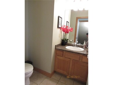 The half bath on the first floor is centrally loca
