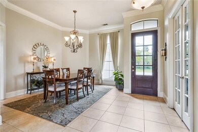 Grand entry with formal dining room...