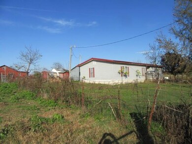 Doublewide and outbuildings