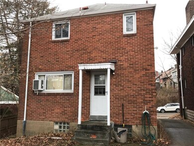 Rear of property from garage facing back door