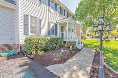 Beautiful landscaping and concrete path.