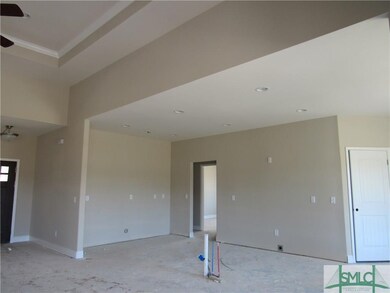 Kitchen opens into living room