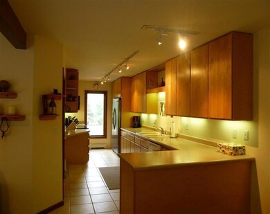 The kitchen offers an abundance of work