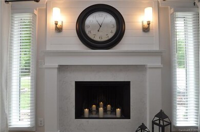 This fireplace is the centerpiece of the room with