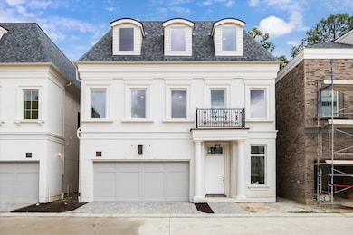 Entry features a solid African Mahogany front door