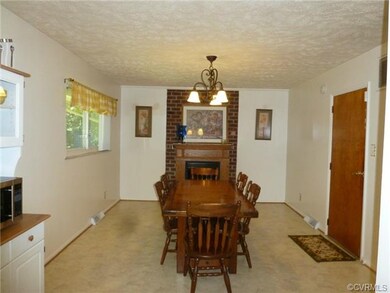 Dining Room with brick fireplace