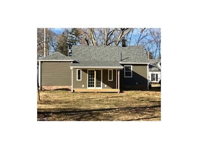rear of house.  Sliding doors from family room to 