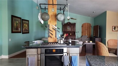 CHECK OUT THIS AWESOME KITCHEN ISLAND WITH GAS RANGE. WHO WOULD'T WANT TO COOK ON HERE.