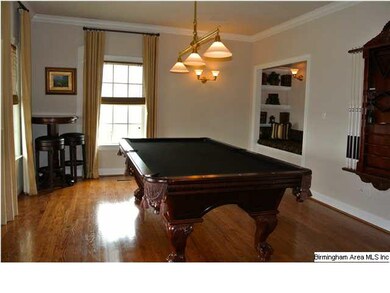 Billards room with reading nook.  Could be used as