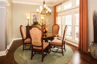 Open formal dining room is tucked away yet conveniently located from the kitchen.  