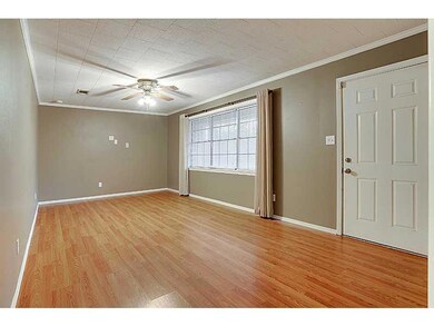 Photo. Front entrance opens into Living/great room