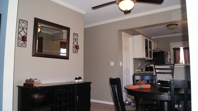 Dining view into hall to master bed