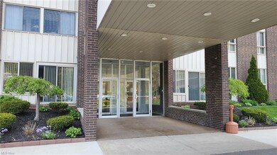 The secured entrance into the building.  A phone s