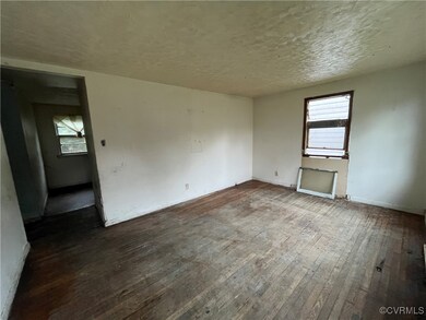 Unfurnished room featuring dark hardwood / wood-st