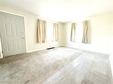 Living room with carpet floors