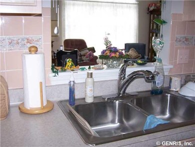 Kitchen This pass thru has a view of the pond acro