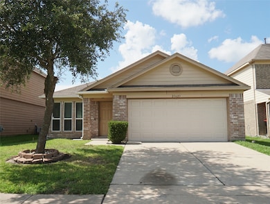 Charming single-story home with a brick exterior,