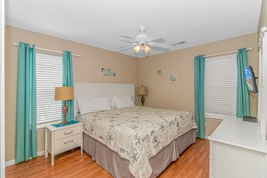 Bedroom with light hardwood / wood-style flooring,