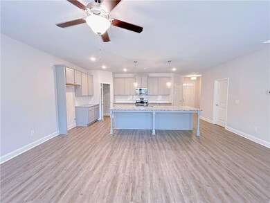Kitchen featuring appliances with stainless steel 