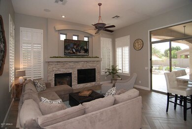 Family Room with stone-clad FP