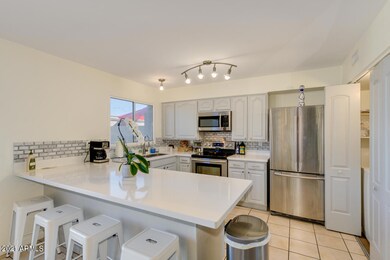 6. QUARTZ STYLE POLISHED KITCHEN ISLAND