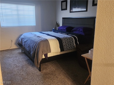 Bedroom featuring carpet