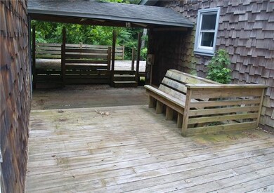 Deck between dwelling and garage