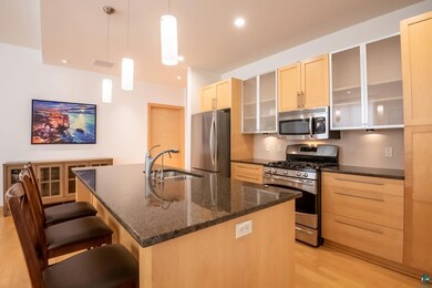 Kitchen with appliances with stainless steel finis