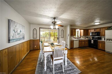 Eat-in kitchen and dining area with hard wood floo