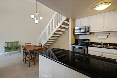 kitchen open to living room/dining area