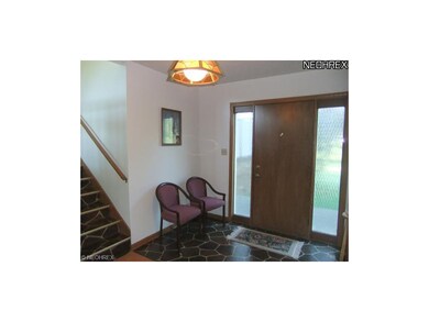 The foyer welcomes you in to the home and starts t