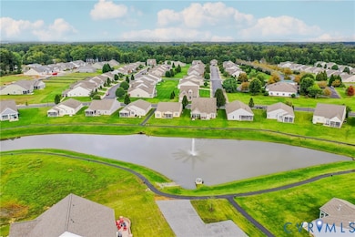 Community Pond with fountian and walking trail