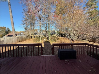Deck featuring a fenced backyard