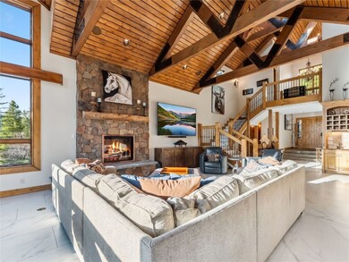 Living area featuring light tile finish floors, st