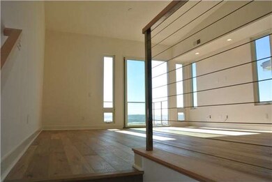 Great room at top of stairs floored in Siberian Oa