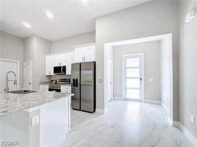 313 Hermosa Ave, Lehigh Acres, FL 33974 - photo 4