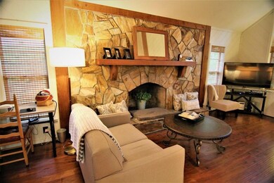 Raised hearth wood-burning fireplace
