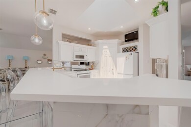 Beautiful Marble Bar with White Quartz countertops