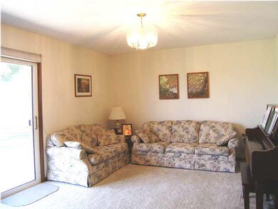 A VIEW OF THE LIVING ROOM FRONT THE ENTRY.