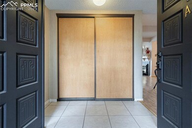 Double entry doors with double screen doors.