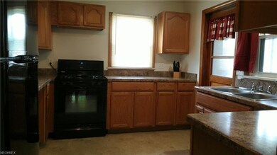 Updated kitchen. Stove and refrigerator stay.