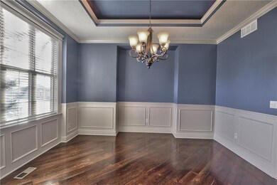 Wainscotting and recessed lighting as well as hard