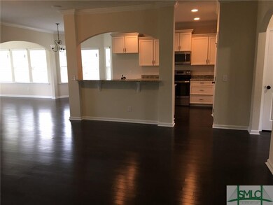 Kitchen is completely open to family room.