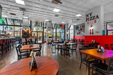 Dining space featuring ceiling fan, a wealth of na